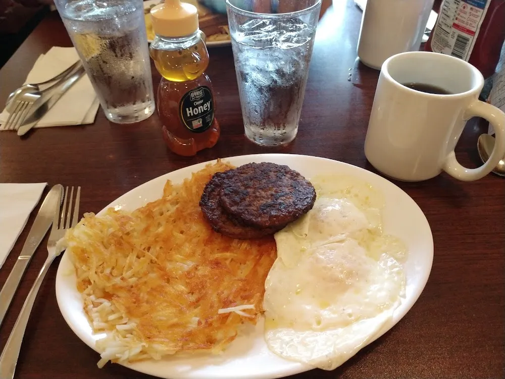 Sausage Patties Hash Browns and Two Egg Breakfast